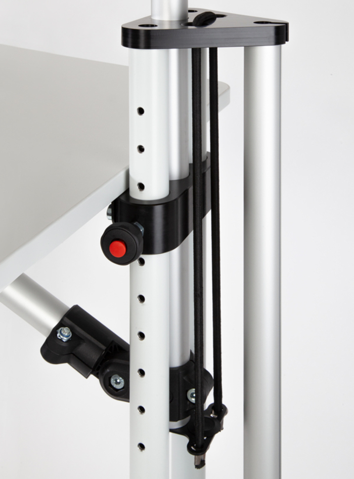 A spring-loaded locking bolt reliably latches the work surface. Thanks to the tieback support the work surface can be adjusted easily.